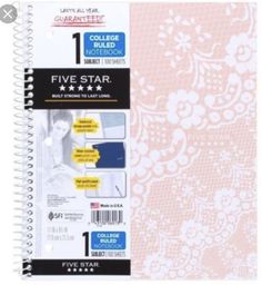 a spiral notebook with five stars on it