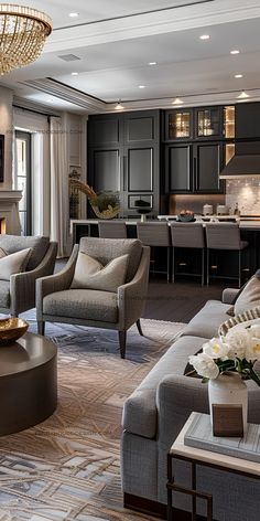 a living room filled with furniture and a fire place in the middle of a kitchen