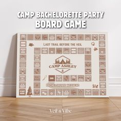 the camp bachelor party board game is on display in front of a white wall and wooden floor