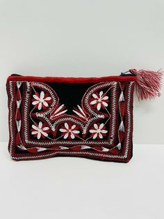 Great customer service is our priority we're Friendly and Helpful Check our Feedbacks We are listing a Brand New never been Used         Authentic Tlahuitoltepec Oaxaca Mexico Description:  100% Authentic Mexican cosmetic bag This Bag is gorgeous. Color: Black red and white Size: Medium Measures: Width: 7.5” Height: 5.5” Check the pictures for exact measurements This Wallet is perfect for any occasion The perfect gift for her Payment: Payment Must be received within 3 days after order is confirm Rectangular Embroidered Cosmetic Bag For Daily Use, Rectangular Cosmetic Bag With Embroidery For Daily Use, Daily Use Rectangular Cosmetic Bag With Embroidery, Artisan Rectangular Bag With Zipper Pouch, Red Rectangular Coin Purse With Zipper, Bohemian Rectangular Travel Cosmetic Bag, Bohemian Rectangular Cosmetic Bag Gift, Bohemian Rectangular Cosmetic Bag For Daily Use, Handmade Rectangular Travel Cosmetic Bag