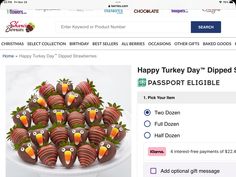 a plate full of chocolate covered strawberries with birds on them and the caption happy turkey day dipped strawberries