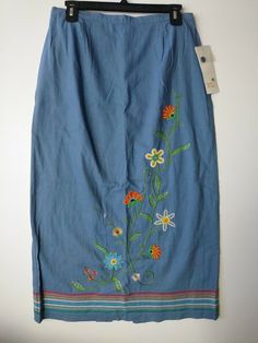 NWT Hearts of Palm SIZE 8 Embroidered Beaded Linen Rayon Blue Floral Skirt  RETAIL PRICE $50.00  Condition is New with tags.  Shipped with USPS First Class Package.  WAIST: 14"  HIPS: 18"  LENGTH: 34" RETAIL PRICE $50.00 VERY GOOD CONDITION.  NEW WITH TAGS. COME BACK SOON AND VISIT.... https://stores.ebay.com/nancysport Traditional Fitted Skirt For Spring, Blue Cotton Bottoms With Embroidered Hem, Summer Embellished Blue Skirt, Spring Bohemian Embellished Skirt, Embellished Blue Skirt For Summer, Summer Blue Embellished Skirt, Bohemian Embellished Skirt For Spring, Traditional Embroidered Spring Skirt, Traditional Embroidered Skirt For Spring