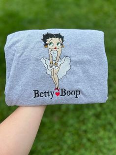 Betty Boop embroidered sweatshirt. 50/50 cotton polyester blend. Please note, this item is made to order. Care Info: Turn inside out to wash. If you have any questions, feel free to reach out! Betty Boop Jacket, Betty Boop Tee Shirts, Betty Boop Blanket, Betty Boop Hoodie, Betty Boop T Shirt, Embroidered Sweatshirts, Betty Boop, Sweat Shirt, Gender Neutral