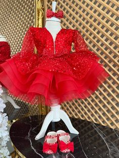 Red Long Sleeve Sequined Baby Girl Dress, Puffy Toddler Christmas Dress, Baby Tulle Christmas Dress, Girls Holiday Tutu Dress This red puffy dress is specially designed and handmade for your baby girl. Your girl will be like a princess with these dresses that she can wear on special occasions such as birthdays, weddings and christmas. This dress, which will create your girl's style with a clasp and shoes, is ideal for special occasions. Check out our baby girl dresses selection for unique handmade dresses from AymiraDesign. ✿ Product Features; ✰ Baby Dress Materials: Sequined Tulle ✰ Baby Dress Color: Red ✰ Set Content: Dress, Clasp, Shoes ✰ Size Options: * 0-3 months, 3-6 months, 6-9 months, 9-12 months, 12-18 months, 18-24 months, 2T, 3T, 4T, 5, 6 US kids' numeric ✰ Note: Shoes are US ch Holiday Tulle Dress With Ruffles, Elegant Holiday Princess Dress In Tulle, Elegant Tulle Princess Dress For Holiday, Holiday Tulle Dress, Christmas Tulle Holiday Dress With Ruffles, Fitted Tulle Princess Dress For Christmas, Fitted Tulle Holiday Dress, Holiday Princess Dress In Tulle, Holiday Tulle Princess Dress