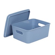 two blue storage baskets with handles on each side and one in the middle, both empty