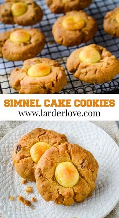 some cookies are cooling on a rack and one has been cut in half to eat