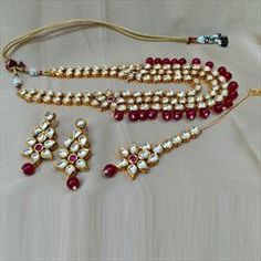 Gold Rodium Polish Red and Maroon color Necklace in Metal Alloy studded with CZ Diamond, Kundan Luxury Ruby Kundan Necklace For Festivals, Maroon Necklace, Color Necklace, Metal Necklace, Maroon Color, Cz Diamond, Super Sale, Metal Necklaces, Red