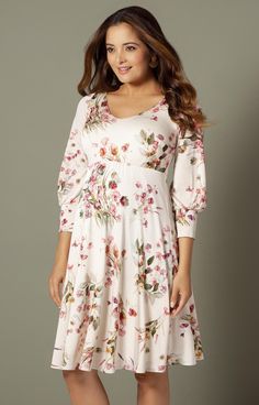 Chic and feminine, our Pixie Maternity Dress in Petal Pink Floral is so flattering to wear. Designed in a lightweight premium silky jersey, this knee length maternity dress skims over your curves leaving you with the most elegant silhouette. Subtle puff sleeves finish at the elbow for that final stylish touch. Fit-and-flare silhouette Empire line defines the waist Cuffed puff sleeves Blissfully soft stretch jersey Flattering v-neckline Floaty skater skirt Effortless slip-on style Fully lined Per Fitted V-neck Maternity Dress With Floral Print, Elegant Spring Maternity Dress With Stretch, Fitted Empire Waist Maternity Dress For Spring, Elegant Stretch Maternity Dress With V-neck, Fitted Floral Print V-neck Maternity Dress, Fitted Maternity Dress With Floral Print And V-neck, Fitted V-neck Floral Print Maternity Dress, Elegant Ruched Maternity Dress For Spring, Fitted V-neck Maternity Dress For Brunch