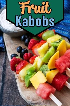 Fruit kebabs on a wooden board with a text overlay title. Super Easy Party Food, Party Food Table, Toddler Finger Foods, Peanut Butter Dip, Fruit Kebabs, Fruit Skewers, Baby Led Weaning Recipes, Fruit Kabobs, Weaning Recipes