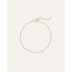 Designed to catch light at all angles, this delicate 14k gold bracelet adds low-key shimmer to any look. Style solo for a minimalist aesthetic or layer them up for the perfect stack. Delicate Gold Bracelet With Satellite Chain For Everyday, Delicate Gold Bracelet With Satellite Chain, Delicate Beaded Bracelets With Satellite Chain, Minimalist 14k Gold Bracelet With Satellite Chain, Minimalist 14k Gold Satellite Chain Bracelet, Dainty Beaded Chain Bracelet For Everyday, Minimalist Everyday Beaded Bracelet With Delicate Chain, Delicate Yellow Gold Beaded Bracelets For Everyday, Minimalist Gold Bracelet With Satellite Chain