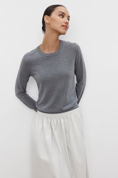 A person standing against a white background wears the Velvet by Graham & Spencer ROXY SWEATER in gray and a light-colored skirt Cami Shirt, Leather Outerwear, Small Sweater, Cardigan Sweater Dress, Dress The Population, Ribbed Neckline, Sweater Sale, Lightweight Sweater, Romper Dress