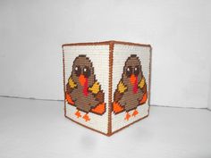 a crocheted book with a turkey on it