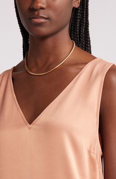 This simple and sleek A-line midi is crafted from luxe silk and topped with dipped necklines. 47" length (size medium) V-neck Sleeveless Unlined 52% viscose, 48% Lenzing™ EcoVero™ viscose Lenzing EcoVero viscose is a sustainably produced fiber using pulp made from renewable wood sources and certified with the EU Ecolabel for high environmental standards, including lower emissions and water usage than generic viscose Machine wash, line dry Imported Gold V-neck Slip Dress For Spring, Chic Gold Sleeveless Slip Dress, Elegant Gold V-neck Slip Dress, Gold Sleeveless Silk Slip Dress, Water Usage, Satin Midi Dress, Nordstrom Dresses, Cork, A Line