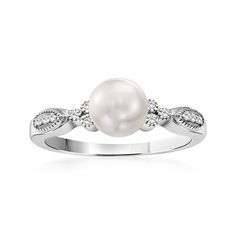 Ross-Simons - 6.5-7mm Cultured Pearl Ring, Diamond Accents in 14kt White Gold. Size 7. Brimming with effortless elegance, this 6.5-7mm cultured freshwater pearl ring makes a fanciful statement with sparking round brilliant-cut diamond accents and lovely milgrain details in polished 14kt white gold. 1/4" wide. White pearl ring. Pearl birthstones are the perfect gift for June birthdays. Cultured Pearl Ring, White Pearl Ring, Pearl Birthstone, Freshwater Pearl Ring, Pearl Ring, Round Brilliant Cut Diamond, Cultured Pearls, Pearl White, Freshwater Pearls