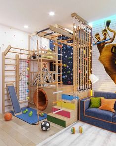 a kid's playroom with climbing wall, slide and ladders for indoor play