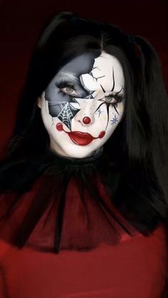 a woman with makeup painted to look like a clown