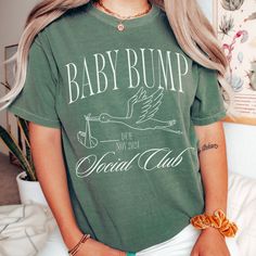 ☀️ Celebrate your summer pregnancy with "The Bump Bump Club Summer Pregnancy Announcement Shirt"! , this comfort colors beach-inspired t-shirt offers both comfort and style, perfect for those warm, sunny days. Personalize it to make your pregnancy announcement uniquely yours. Grab yours today and share your joy in the most special way! 👕 PRODUCT INFO The Comfort Colors 1717 shirt is made of 100% ring-spun cotton, pre-shrunk, and double-needle stitched for added durability. It offers a relaxed f Maternity Graphic Tee With Short Sleeve, Maternity T-shirt With Graphic Print And Relaxed Fit, Summer Maternity T-shirt With Crew Neck, Maternity Summer T-shirt Crew Neck, Summer Maternity Crew Neck T-shirt, Summer Maternity Cotton T-shirt, Maternity Graphic T-shirt With Crew Neck, Maternity Casual T-shirt With Funny Print, Casual Maternity T-shirt With Funny Print