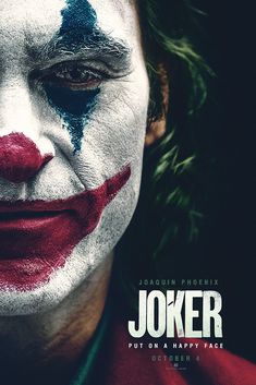 the joker movie poster with his face painted red, white and blue