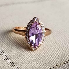 New 18k Rose Gold Plated Over 925 Silver Filled Marquise Cut Amethyst Diamond Ring For Women All Gemstones Are Simulated. A Jewelry Box Included. Ready To Ship Same Day. Feel Free To Ask Any Question. All Photos Are Real Time From Actual Object No Stock Photo Used. Color Might Be Slightly Different Due To Lighting. Fine Jewelry Amethyst Ring In Rose Gold, Rose Gold Amethyst Ring Fine Jewelry, Rose Gold Amethyst Ring With Gemstone Accents, Pink Amethyst Fine Jewelry Ring, Rose Gold Amethyst Ring With Gemstone Accents For Anniversary, Rose Gold Cubic Zirconia Rings With Gemstone Accents, Elegant Rose Gold Amethyst Ring With Birthstone, Elegant Rose Gold Amethyst Birthstone Ring, Rose Gold Amethyst Jewelry With Halo Setting