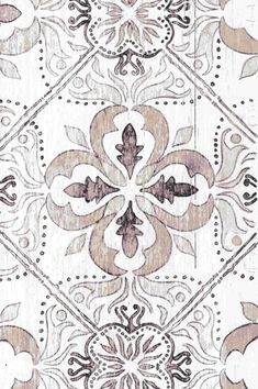 an old fashioned tile pattern in brown and white