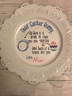 a white plate with the words dear easter bunny on it and an egg in the middle