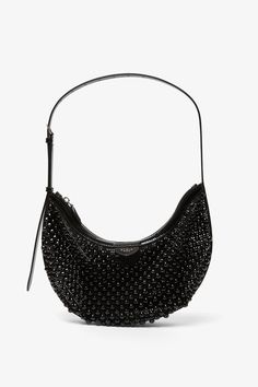 Black fishnet shoulder bag from Alaïa. The One piece shoulder bag is made of black fishnet and patent leather decorated with pyramid-shaped studs. It features a zipped top and detachable patent leather pouch to fit all your belongings.Measurements: L31 x H16,5 x W3 cmMade in Italy Evening Hobo Shoulder Bag With Gunmetal Hardware, Party Shoulder Bag With Gunmetal Hardware And Top Handle, Luxury Bags With Zipper Closure For Night Out, Modern Black Bag For Night Out, Black Hobo Bag With Removable Pouch For Party, Black Party Bags With Gunmetal Hardware, Black Shoulder Bag With Gunmetal Hardware For Party, Party Shoulder Bag With Gunmetal Hardware, Black Fishnets