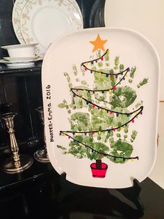 a plate with a christmas tree painted on it