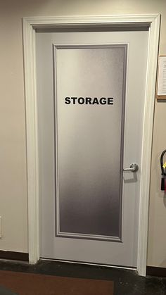 a white door with the word storage on it