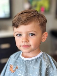 Give your little man a stylish makeover with these 28 adorable toddler boy haircut ideas. From classic styles to modern trends, find the perfect cut to complement your child's unique personality. These haircuts are designed to be low-maintenance and withstand all the activities of childhood. Discover a variety of options that will keep your toddler boy looking cute and feeling great throughout his daily adventures! Child Haircut Boy, Hair Styles For Little Boys, Toddler Haircuts Boy, Baby Boys First Haircut, Little Boy Haircut Toddler, Boy Toddler Haircut, Hairstyles For Baby Boys, Toddler Boy Haircut Curly, Little Boys Hairstyles