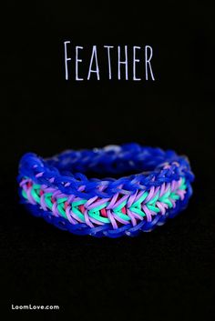 a close up of a bracelet on a black background with the words featherer written above it