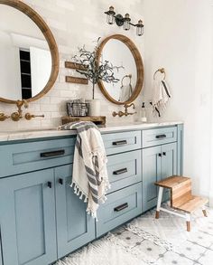 Discover how to elevate your home with modern farmhouse decor and create a cozy, chic space. Get expert tips and ideas for incorporating this popular style into your interiors. Luxury Master Bath, Blue Cabinets, Chic Bathrooms, Bathroom Redo, Bath Remodel