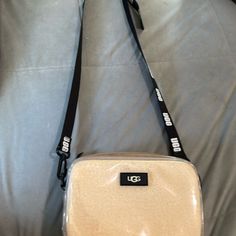 Ugg Purse New With Tags And Bag For Storage Cream And Black Color Never Used Ugg Purse, Ugg Purses, Ugg Bag, Mini Bags, Womens Uggs, Black Cream, Mini Bag, Black Color, Bag Lady