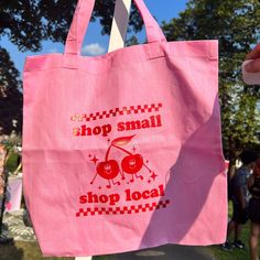 Shop small and local! This super cute pink tote bag has a red checkered and cherry design - it’s perfect for your everyday tote, farmer’s market bag or beach tote. 15” long x 14.75” wide Summer Grocery Tote Bags, Retro Pink Bags For Summer, Retro Pink Bags For Spring, Retro Pink Summer Bags, Retro Pink Cotton Bag, Gingham Cotton Bags For Summer, Summer Cotton Gingham Bags, Summer Gingham Cotton Bags, Cherry Design