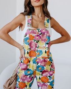 Look blooming fabulous in our Paxton Floral Pocketed Overalls! Bursting with vibrancy and style, these overalls are perfect for those sun-drenched days of summer. Enjoy the comfort of two front pockets as you show off your floral finesse. Get your petals to the party! Size Guide: Lisa is 5’6” tall, and has a 33.25” bust, 26.5” waist, & 35.6” hips. She is wearing a S / US 4 / AU 8. This jumpsuit is true to size. Material: 100% denim cotton. Feature: Lightweight Denim Fabrication. Sleeveless. Stra Colorful Jumpsuit, Cotton Jumpsuit, Whimsical Fashion, Mood Board Fashion, Floral Jumpsuit, Denim Cotton, Relaxed Style, Pretty Outfits, Oasis