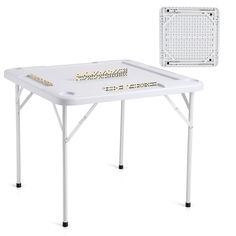 a white folding table with gold letters on it