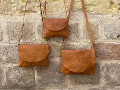 "We handmade this cross body leather purse in three different sizes: small, medium, or bigger. This minimalist and functional, plain bag is made with soft, best quality Italian leather. We designed it with a zipper and flap.   The color of this leather handbag we call Tan but is also similar to light brown, light cognac, camel color, or toffee. It's just like the colour of when very natural leather gets darker with time. A pure single color versatile fine leather purse is both casual and fun. We Tan Handbags, Soft Leather Bag, Leather Clutch Bag, Brown Purses, Black Leather Handbags, Leather Clutch Bags, Leather Crossbody Purse, Camel Color, Small Wallet