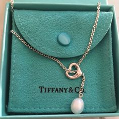 Authentic Tiffany & Co. Elsa Peretti Open Heart Lariat Pearl Necklace, Like New In Box As Shown: ( No Signs Of Wear, Looks Brand New! ) Offers Welcome! Thanks For Visiting. :) Solid Sterling Silver With Fresh Water Cultured Pearl. 19" Long 9.9.5mm Pearl Elegant Heart-shaped Lariat Necklace For Anniversary, Elegant Lariat Necklace With Heart Charm, Elegant Heart-shaped Lariat Necklace With Adjustable Chain, Elegant Adjustable Lariat Necklace With Heart Pendant, Elegant Adjustable Heart Pendant Lariat Necklace, Elegant Heart-shaped Lariat Necklace, Elegant Lariat Necklace For Valentine's Day Anniversary, Elegant Heart Pendant Lariat Necklace For Gift, Elegant Heart Pendant Lariat Necklace For Valentine's Day