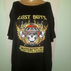 Lost Boys Motorcycle Black Tee Shirt Soft, Polyester Material. Runs A Little Small So Please Order Up A Size. Fits Like A M/L 28 Inches Long 23 Inches Armpit To Armpit Also Available In Guns & Roses, Kiss, Willie Nelson, Ac/Dc, Etc. Rock N Roll, Vintage, Pop Idols, Music Groups, T-Shirt Sale, Buy More And Save! Black Biker T-shirt With Graphic Print, Biker Black T-shirt With Graphic Print, Biker Style Screen Print Tops For Streetwear, Biker Style Tops With Screen Print For Streetwear, Biker Style Crew Neck Top With Logo Print, Edgy Black Top With Front Print, Black Band Merch Crew Neck Top, Biker Style Crew Neck Top With Screen Print, Black Biker Top With Screen Print