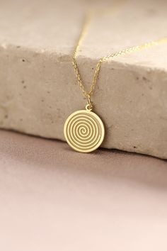 Gold Spiral Pendant - Geometric Gold Necklace ● Material of pendant: Solid Gold 14k ( REAL GOLD ) ● Metal Stamp: 14k ( REAL GOLD ) ● The pendant is available in 5 sizes: - 12,7 mm / 0.5 inches (Diameter) - 14,0 mm / 0,55 inches ( Diameter ) In the photos - 15,3 mm / 0.6 inches ( Diameter ) - 16,5 mm / 0,65 inches ( Diameter ) - 19,1 mm / 0,75 inches ( Diameter ) ( In the photos the size is 14mm / 0.55 inches Diameter ) ( Jump Ring inner diameter: 4 mm ) ● Material of chain: Solid gold 14k ( REAL Elegant Spiral Necklaces For Jewelry Making, Handmade Spiral Yellow Gold Jewelry, Handmade Gold Swirl Jewelry, Gold Handmade Swirl Jewelry, Gold Swirl-shaped Handmade Jewelry, Handmade Swirl Shaped Gold Jewelry, Gold Swirl Handmade Jewelry, Minimalist Gold Spiral Jewelry, Elegant Swirl Necklace For Gift