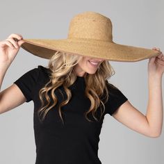 Protect yourself from the sun in style with this Sun Dial Women's Ultrabraid Round Crown Floppy. Its 8" wired brim and adjustable fit are designed for maximum comfort and sun protection with UPF 50+. Crafted to perfection with 75% paper and 25% polyester, this floppy hat comes in Toast color that adds the perfect finishing touch to your outfit. Features: Color: Toast Material: 75% Paper, 25% Polyester Brim Size: 8" Size: 57cmSun Protection: UPF 50+ Adjustable Adjustable Beige Hats For Vacation, Lightweight Curved Brim Hat For Beach, Lightweight Curved Brim Beach Hat, Lightweight Beach Hat With Curved Brim, Lightweight Wide Brim Hat For Beach Season, Lightweight Wide Brim Hat For Beach, Lightweight Wide Brim Hat For The Beach, Wide-brim Lightweight Hat For Beach Season, Lightweight Adjustable Hats For Sunbathing