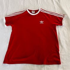 Adidas T-Shirt, Size L, Used In Good Condition. Basic Crew Neck T-shirt With Three Stripes, Cotton Crew Neck Tops With Three Stripes Branding, Relaxed Fit Short Sleeve Tops With Three Stripes, Basic Three Stripes Crew Neck T-shirt, Adidas Basic T-shirt With Three Stripes, Basic Adidas T-shirt With Three Stripes, Adidas Red Short Sleeve T-shirt, Sporty Red Crew Neck T-shirt, Graphic Tee With Three Stripes And Short Sleeves