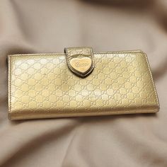 Gucci Gold Guccisima Leather Long Heart Snap Wallet. Authentic Vintage Gucci Long Wallet With Gold Hardware., Exterior Change Compartment With Snap Closure. Tonal Leather Lining Made In Italy. 7.5” L X 4” H. 7 Double Entry. Card Slots.. 4 Interior Bill Slots And Snap Closure At Side. Snap Is Snappy. Slight Marks Can Be Found On Wallet With Careful Look, As Leather Does Age. But Overall, Excellent Used Condition. Feel Free To Ask Questions. Beautiful Wallet. Heart Wallet, Heart Snap, Snap Wallet, Double Entry, Side Snap, Long Wallet, Vintage Gucci, Gucci Bag, Gold Hardware