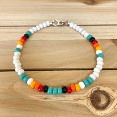 The Sunrise bracelet is perfect for a fun day in the sun. The ombre colors make you feel like you're at the beach...even if you can't actually be there. This high quality beaded bracelet is secured with a sterling silver lobster claw and made with glass beads that can stand the test of time, making it perfect for everyday use. I have lots of other beautiful jewelry pieces so make sure you check those out too! My goal is to give you the best experience possible! Please contact me with any questio Beach Season Tiny Beads Bracelets, Multicolor Heishi Beads Bracelets For Vacation, Beachy Adjustable Friendship Bracelets With Colorful Beads, Rainbow Beaded Friendship Bracelets For Beach, Multicolor Tiny Beads Bracelets For Beach Season, Multicolor Tiny Beads Bracelet For Beach Season, Adjustable Multicolor Beaded Beachy Bracelet, Multicolor Tiny Beads Bracelets For Vacation, Multicolor Tiny Beads Bracelet For Vacation