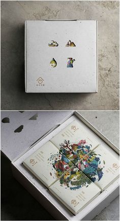 two boxes with different designs on them and one is opened to show the inside of it