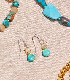 Embrace the natural allure and vibrant energy of turquoise with these earrings. Elevate your look and embrace the bohemian spirit while making a connection to your inner beauty. Dimensions: 3/4" long Turquoise Earrings Dangle, Accessories Jewelry, Inner Beauty, Freshwater Pearls, Hoop Earrings, Dangle Earrings, Turquoise, Beads, Sterling Silver