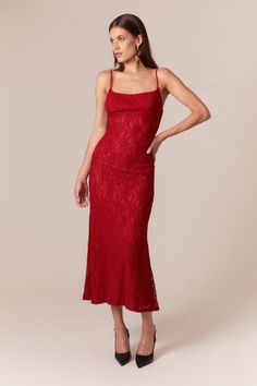 Party pieces that embrace the maximalist in you. The Ruby Lace Midi Dress entices in a bold, red lace fabrication. It features a softly squared neckline, adjustable slim straps and a midi hemline with a hit of flare.

SIZING: True to size. AU: Model wears a size 8 / US: Model wears a size 4.

FABRICATION: Main: 100% Nylon. Lining: 97% Polyester, 3% Elastane.

- Lace fabric
- Midi length
- Adjustable straps
- Fully lined Red Black Lace Dress, Classy Midi Dresses, Plus Size Red Dress, Corsets Fashion, Red V Neck Dress, Berry Dress, Day To Night Dresses, White Cocktail Dress, Red Cocktail Dress