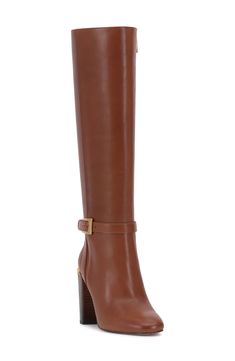 Gleaming goldtone hardware accentuates the slim ankle straps of a knee-high boot shaped from smooth, rich leather. 3 1/2" heel Side zip closure 15 1/4" shaft; 15" regular calf circumference 15 1/4" shaft; 16" wide calf circumference 15 1/4" shaft; 17 1/4" extrawide calf circumference Leather upper/synthetic lining and sole Imported Wide Calf Tall Boots, Extra Wide Calf Boots, Wide Calf Knee High Boots, Brown Heeled Boots, Fall Winter Shoes, Leather Belt Buckle, Brown Knee High Boots, Tall Brown Boots, Wide Calf Boots