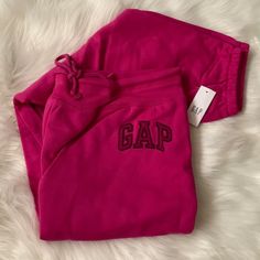 Gap Logo Fleece Joggers *New With Tags *Size Large Regular *Color: Hot Magenta *Banded Drawstring Waist *Dark Magenta Embroidered Gap Logo *Banded Ankles *Materials: Polyester, Elastane Gap Relaxed Fit Sweats For Loungewear, Gap Casual Sweats For Loungewear, Casual Gap Sweats For Loungewear, Gap Athleisure Sweatpants With Pockets, Pink Joggers For Fall Loungewear, Pink Fall Joggers For Loungewear, Cozy Pink Cotton Sweatpants, Gap Cotton Sweatpants For Loungewear, Gap Cotton Athleisure Sweatpants