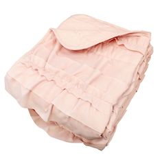 a pink blanket with ruffles on the top and bottom is folded in half