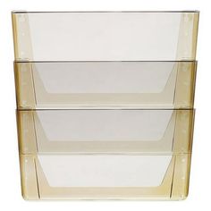 three glass shelves are stacked on top of each other in the shape of rectangles